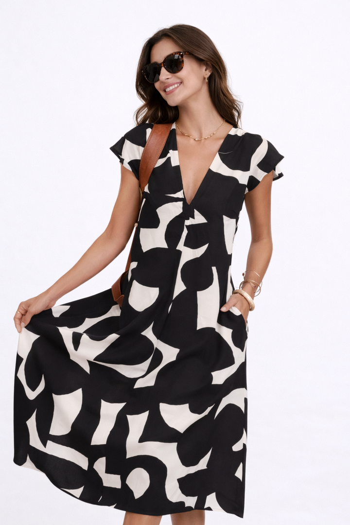 Camelia | Fluid Cut Midi Dress with Vibrant Print